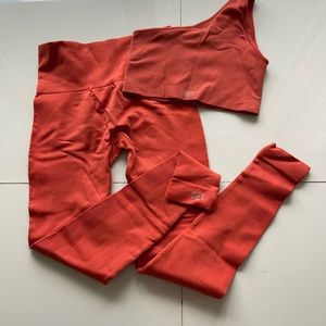 SET active orange one shoulder top workout set